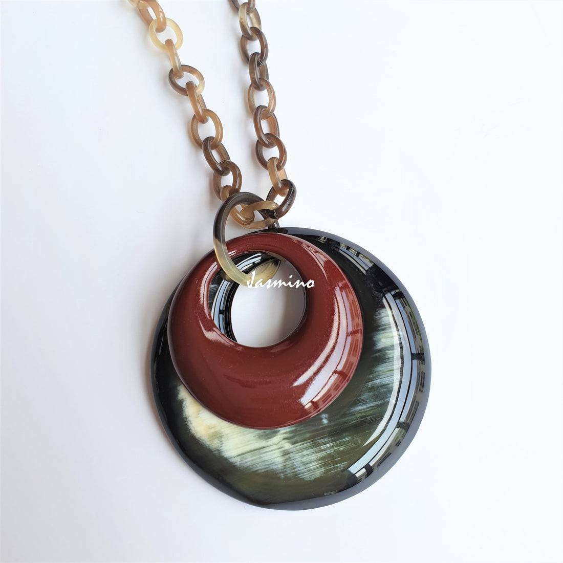 Unique handmade double circle pendant features black and brown made of natural buffalo horn