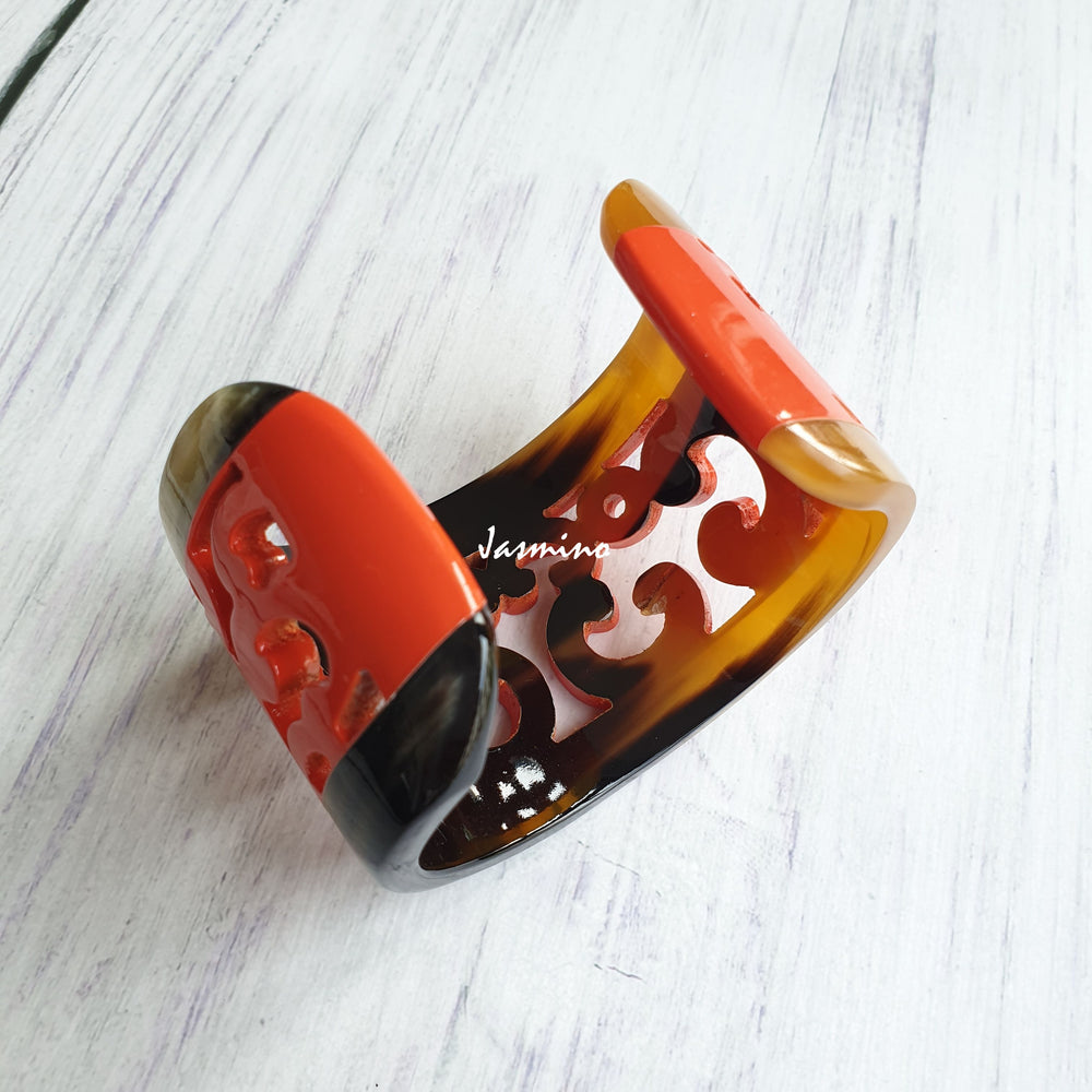 
                  
                    unique handmade Vintage cuff bracelet has a central orange engraving with brown in natural buffalo horn for Thanksgiving
                  
                