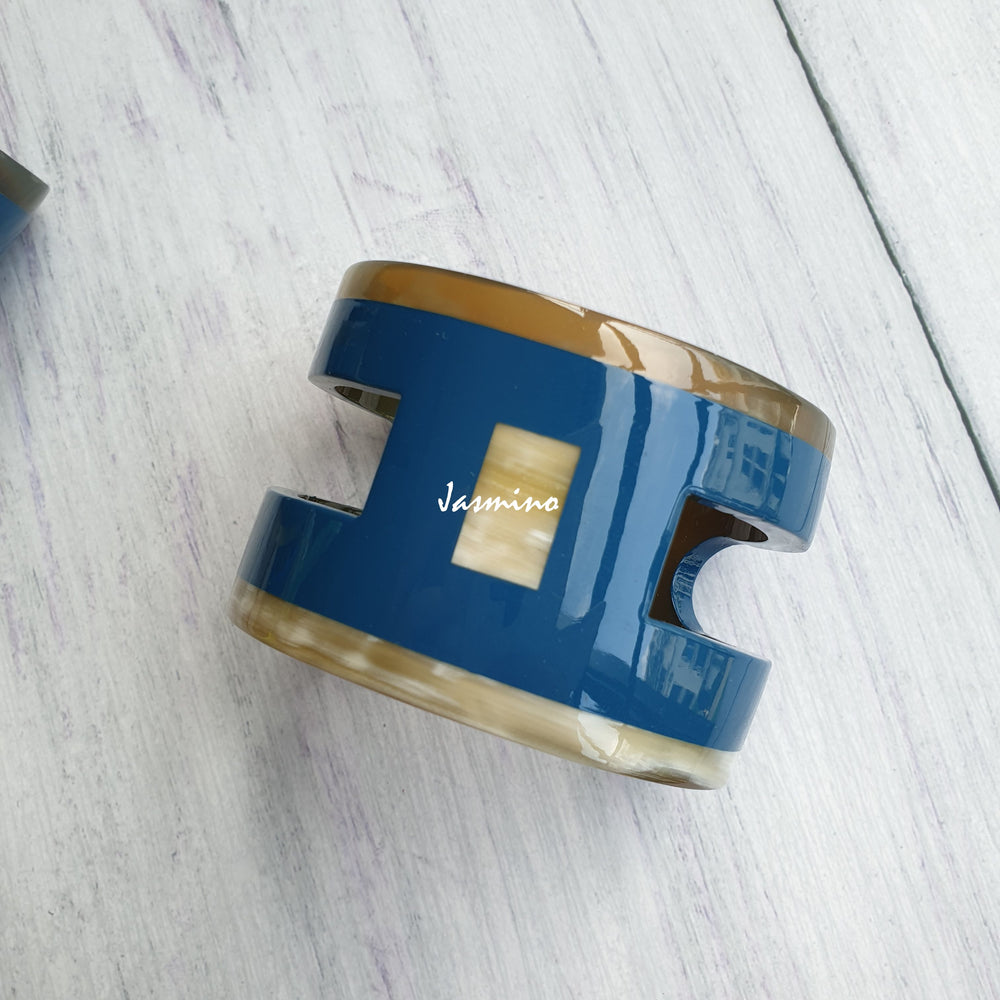 
                  
                    Unique handmade Vintage H shaped cuff bracelet features brown and navy in natural buffalo horn for women
                  
                