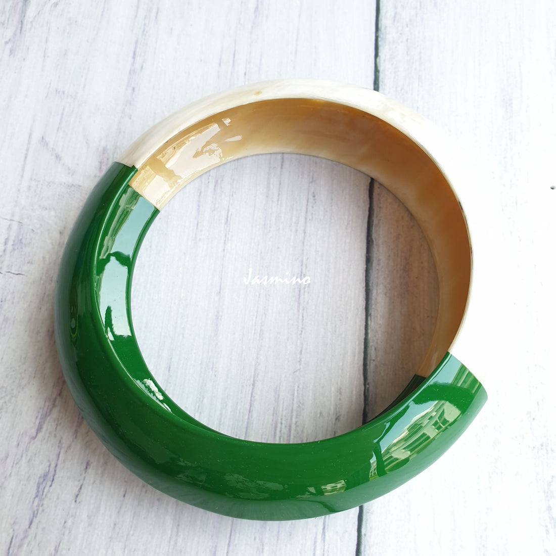 Jasmino unique handmade bangle bracelet is detailed by a green half and a white half in natural buffalo horn for Christmas gifts