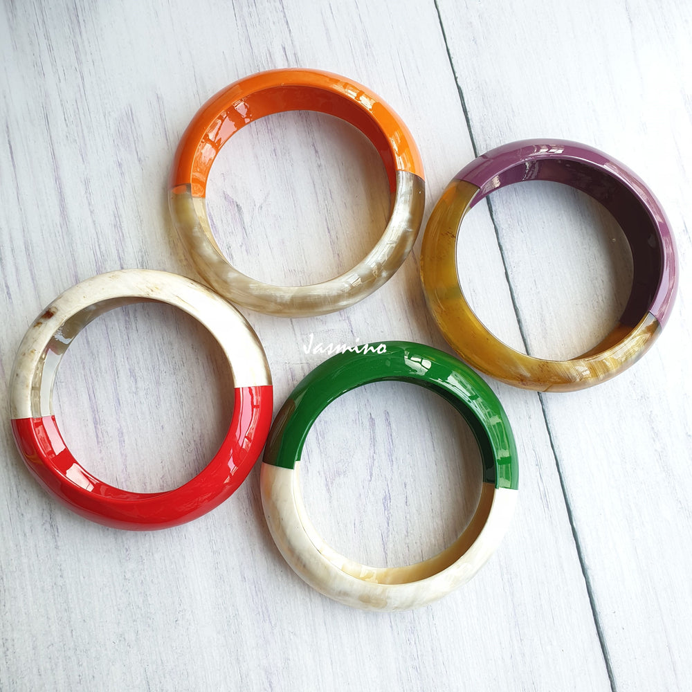 
                  
                    Four Jasmino unique handmade bangle bracelet in natural buffalo horn for Christmas gifts
                  
                