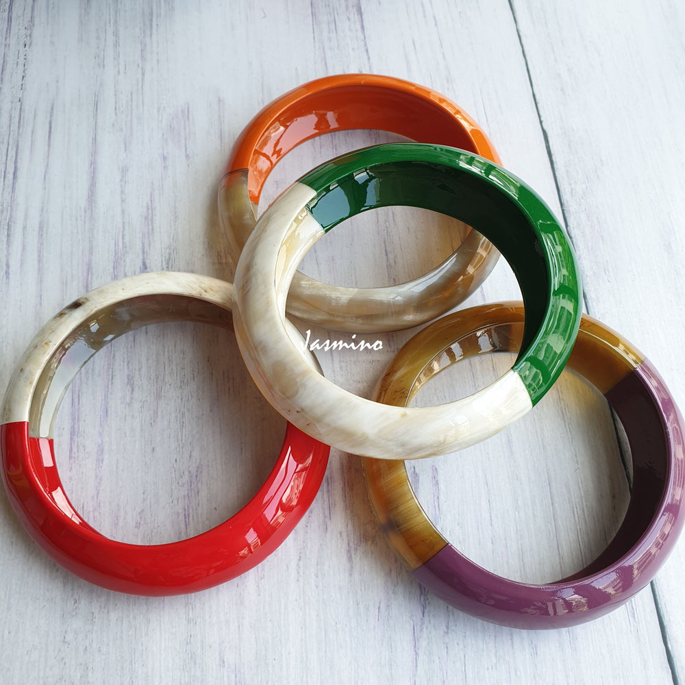 
                  
                    Four Jasmino unique handmade bangle bracelet in natural buffalo horn for Christmas gifts
                  
                