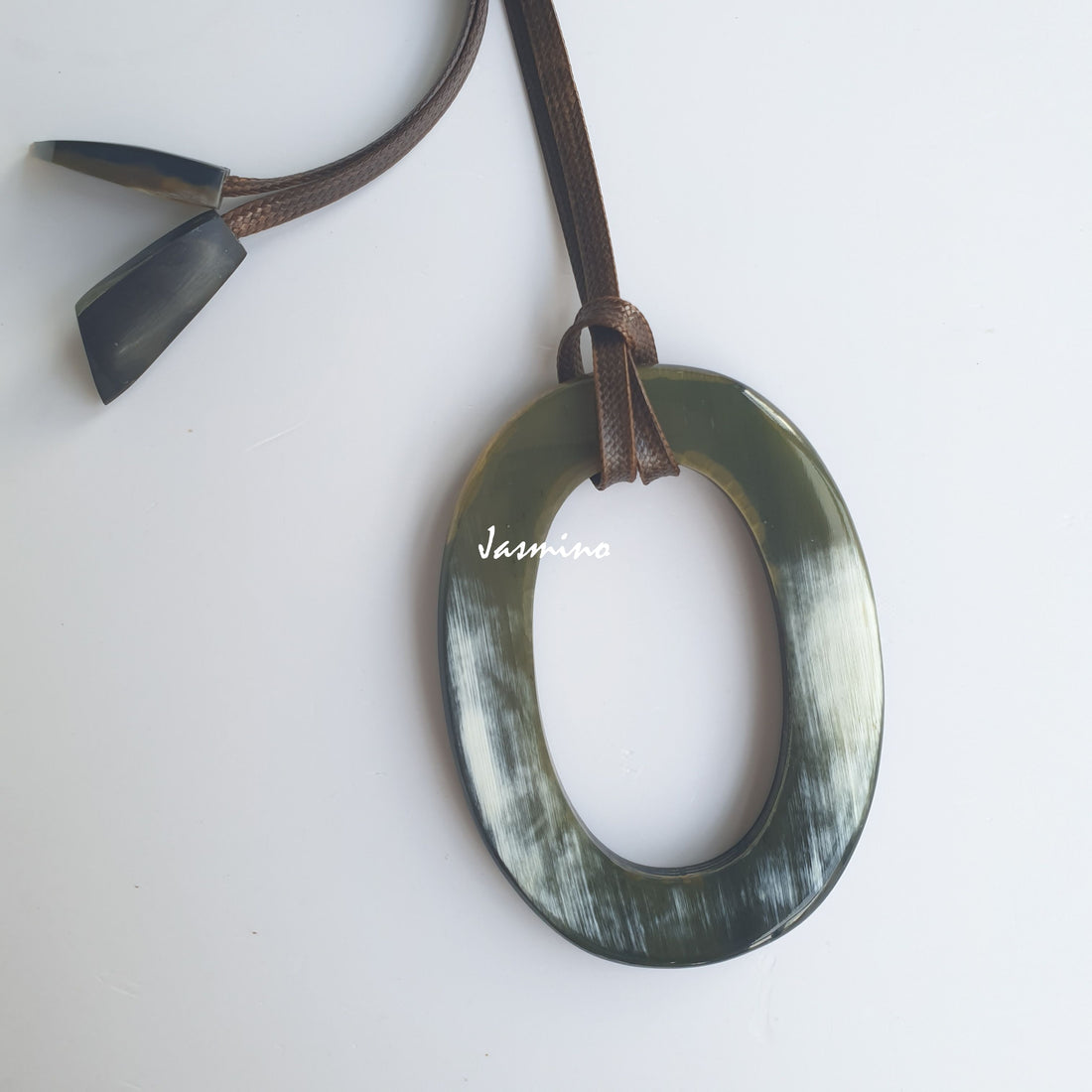 Unique handmade Vintage large oval pendant features a dark colour that is made of natural buffalo horn