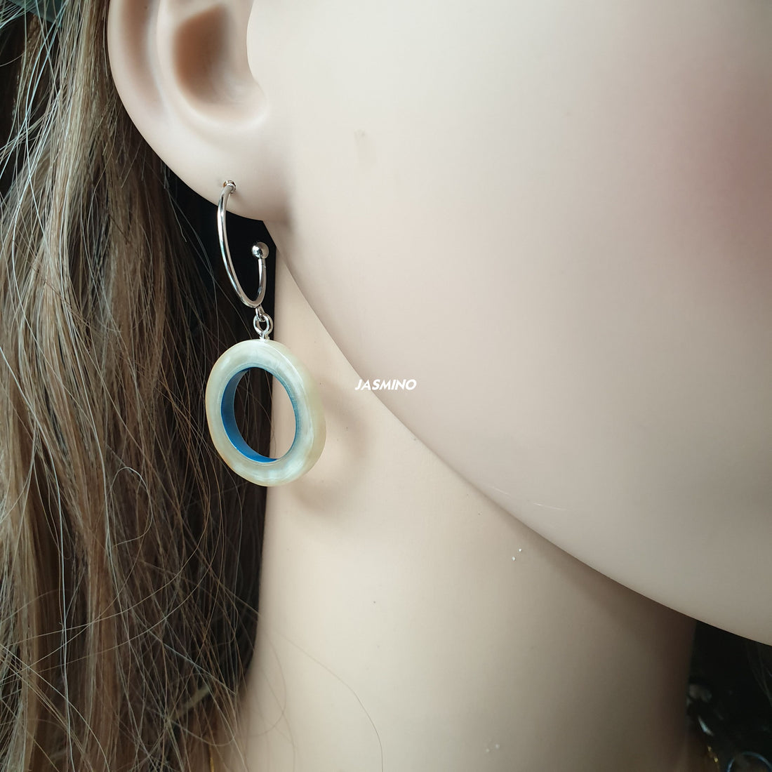 handmade bright circle hoop earrings feature blue inside in natural buffalo horn for Spring 2023