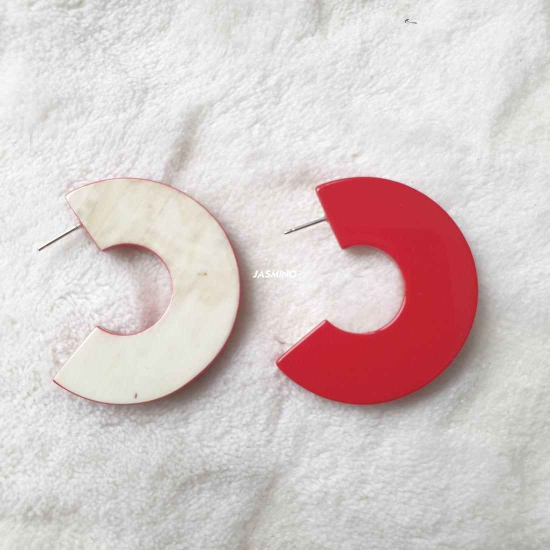 handmade C shaped stud earrings feature scarlet red in natural buffalo horn for Spring 2023