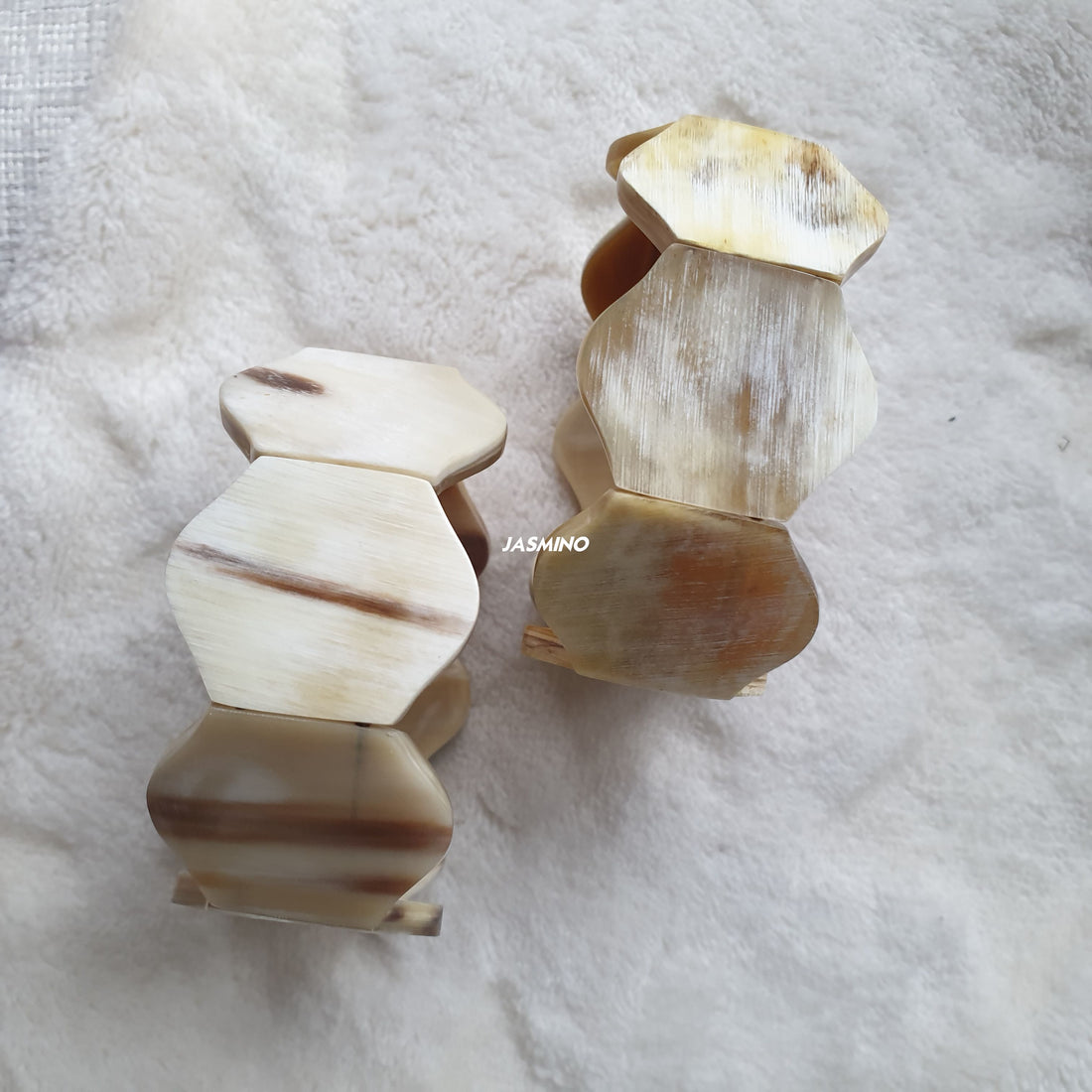 two bright geometric bangle bracelets in natural buffalo horn 