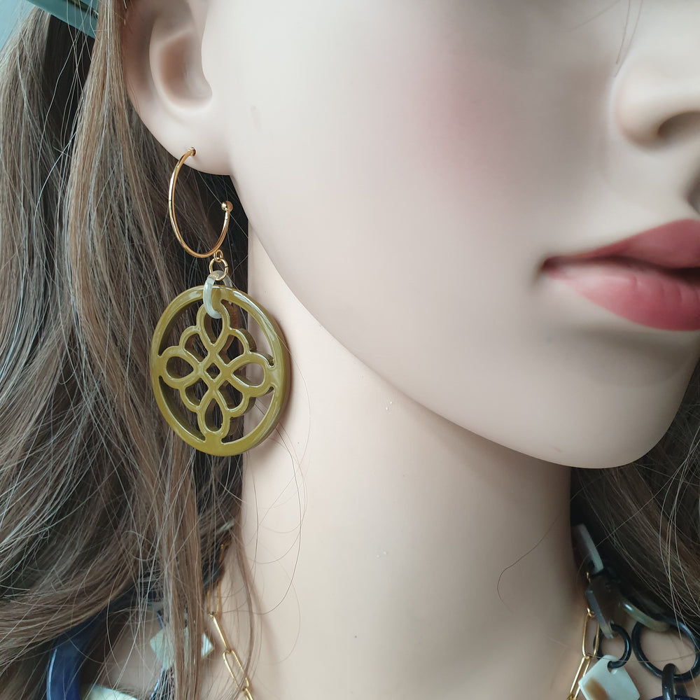 
                  
                    handmade circle hoop earrings feature taupe and floral shape in natural buffalo horn for Spring 2023
                  
                