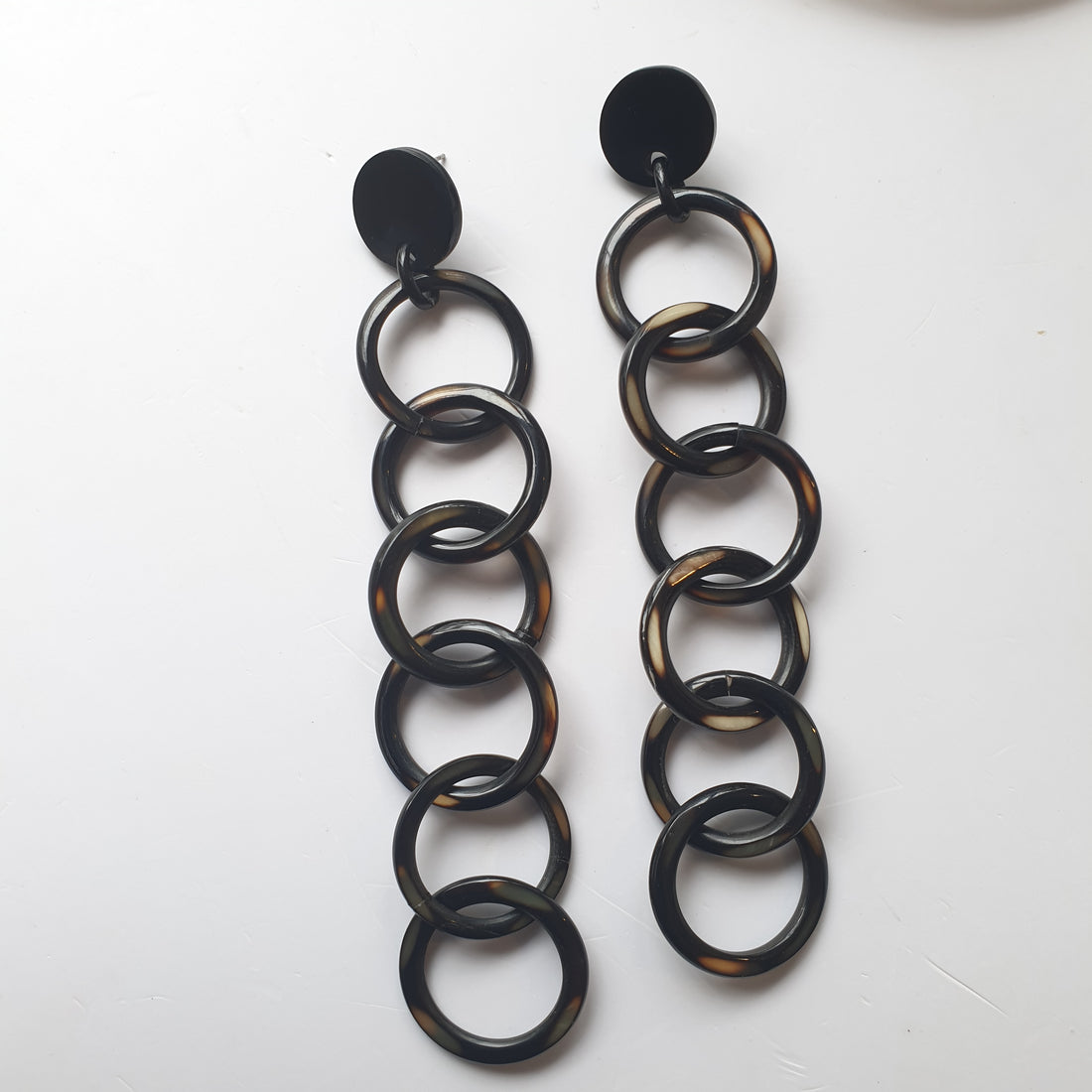 handmade chain link earrings feature black in natural buffalo horn for Spring 2023
