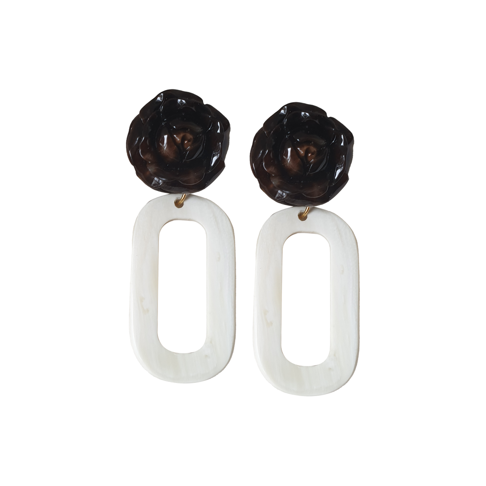 
                  
                    handmade earrings feature rose black and white rectangle in natural buffalo horn for Spring 2023
                  
                