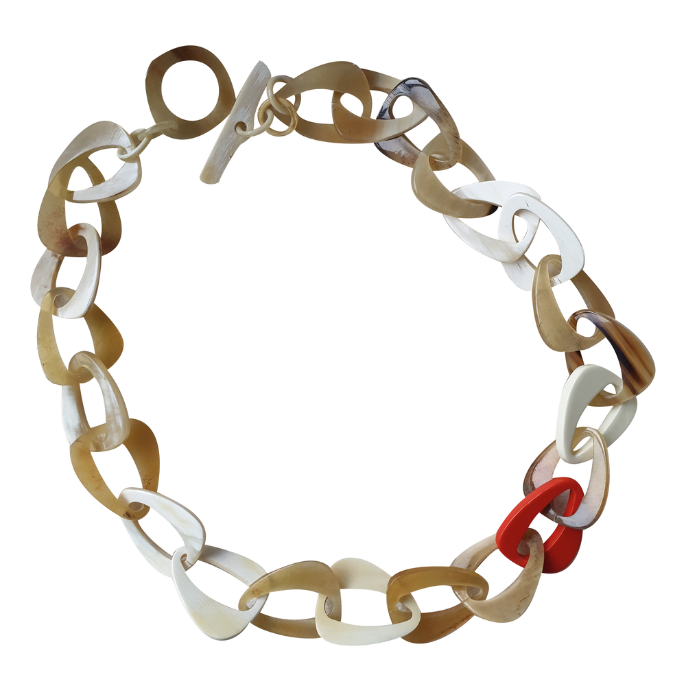 
                  
                    handmade chain link necklace features brown, red, and white in natural buffalo horn for Spring 2023
                  
                