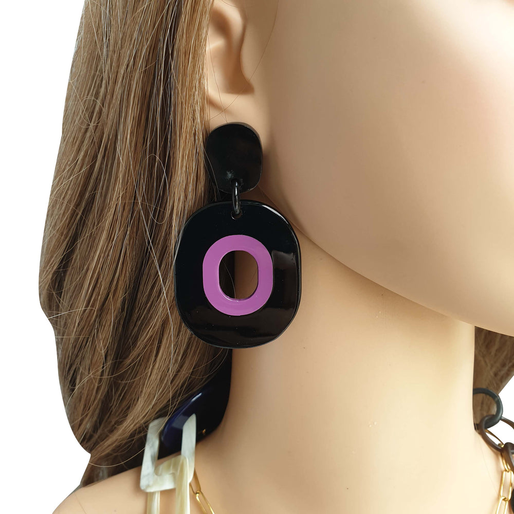
                  
                    unique handmade drop earrings feature black in natural buffalo horn
                  
                