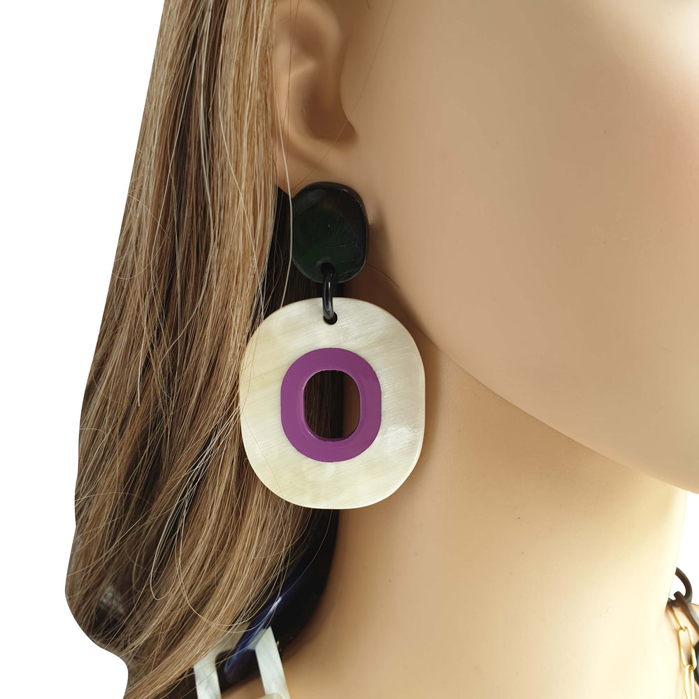 
                  
                    unique handmade drop earrings feature bright colour in natural buffalo horn
                  
                