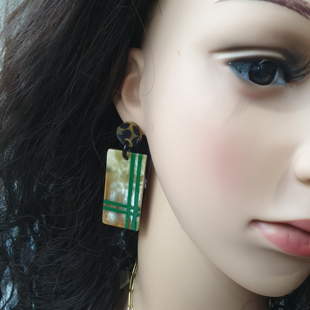 
                  
                    trendy spotted leopard rectangle drop earrings are detailed by a green stripe rectangle in natural buffalo horn for Christmas gifts 2022
                  
                