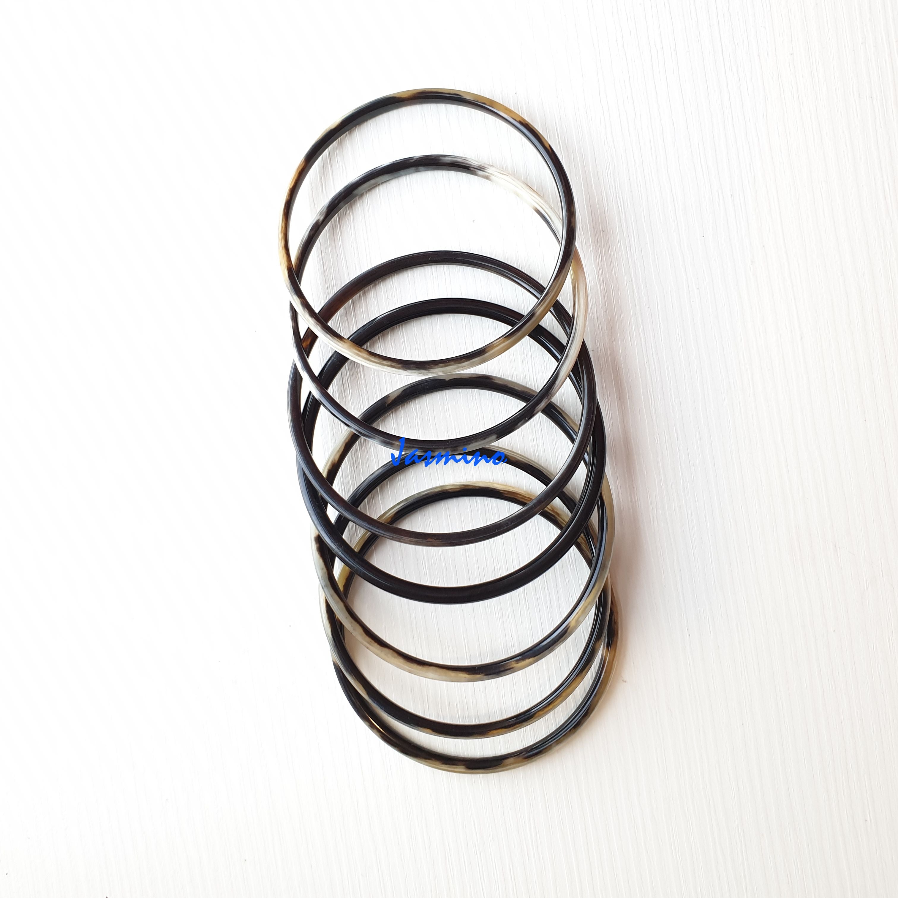 A set of unique handmade Minimalist thin black bracelet in natural buffalo horn for women