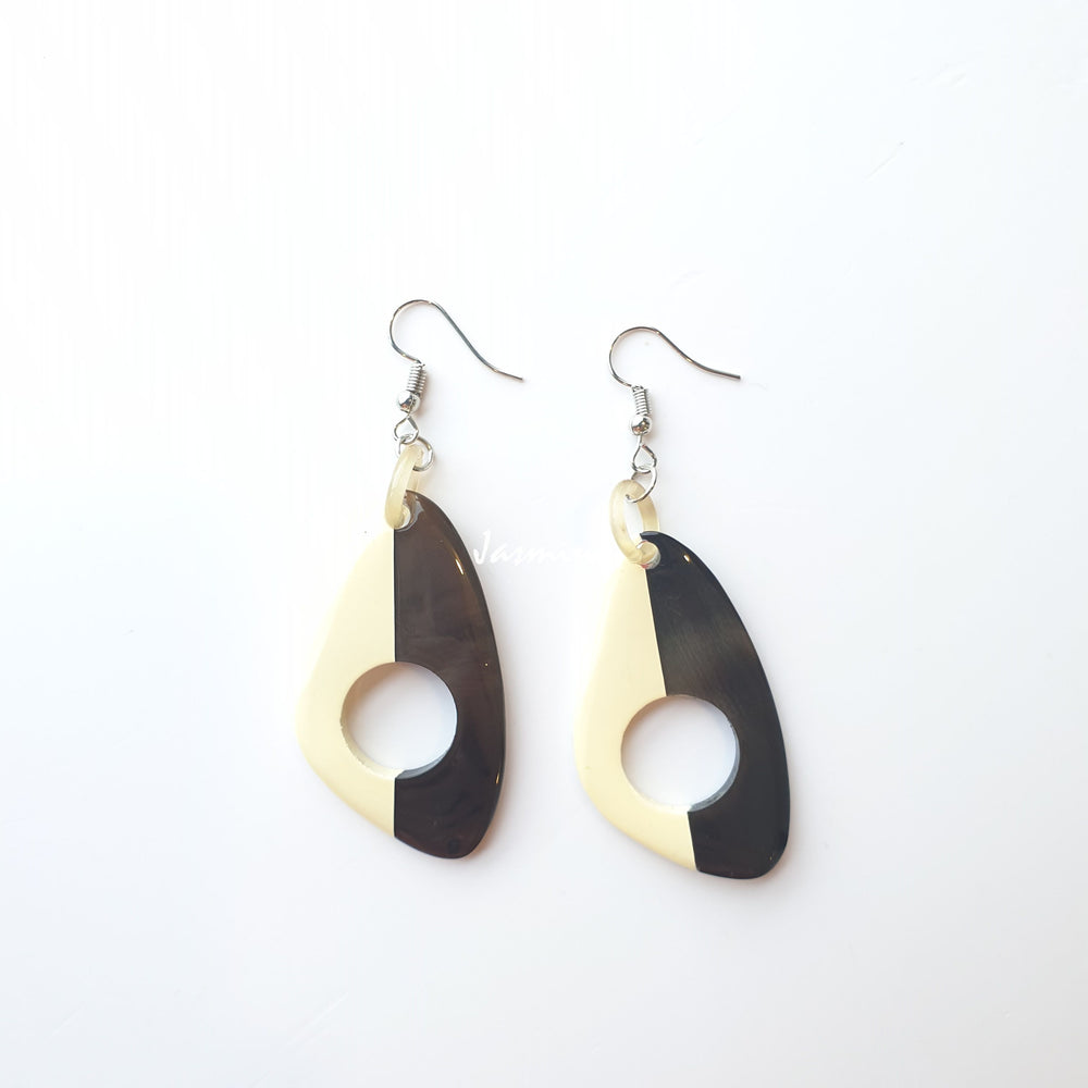 
                  
                    Unique handmade earrings with half natural horn and half painted beige on the light background, impressive gift for her
                  
                