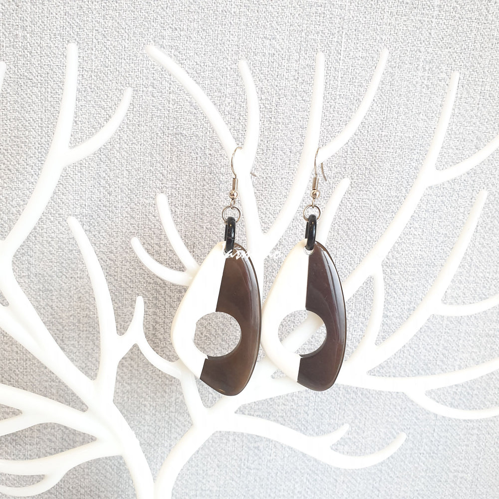 
                  
                    Unique handmade earrings with half natural horn and half painted bright white on the light background- 5cm, impressive gift for her
                  
                