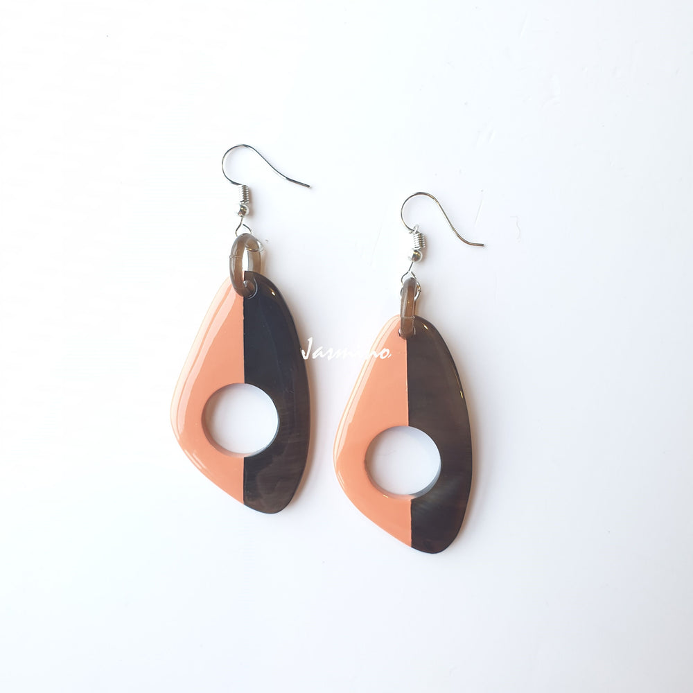 
                  
                    Unique handmade earrings with half natural horn and half painted salmon on the light background, impressive gift for her
                  
                