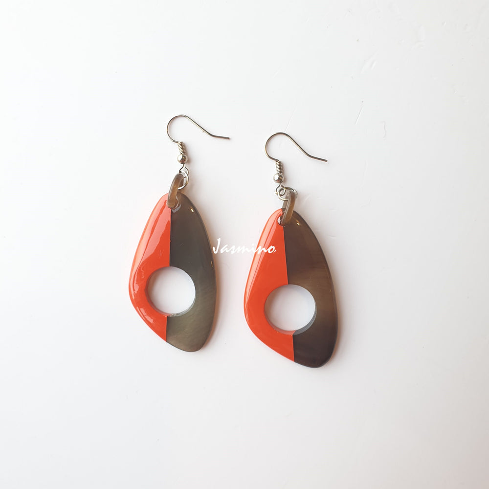 
                  
                    Unique handmade butterfly earrings with half natural horn and half painted orange peel on the light background, impressive gift for her
                  
                
