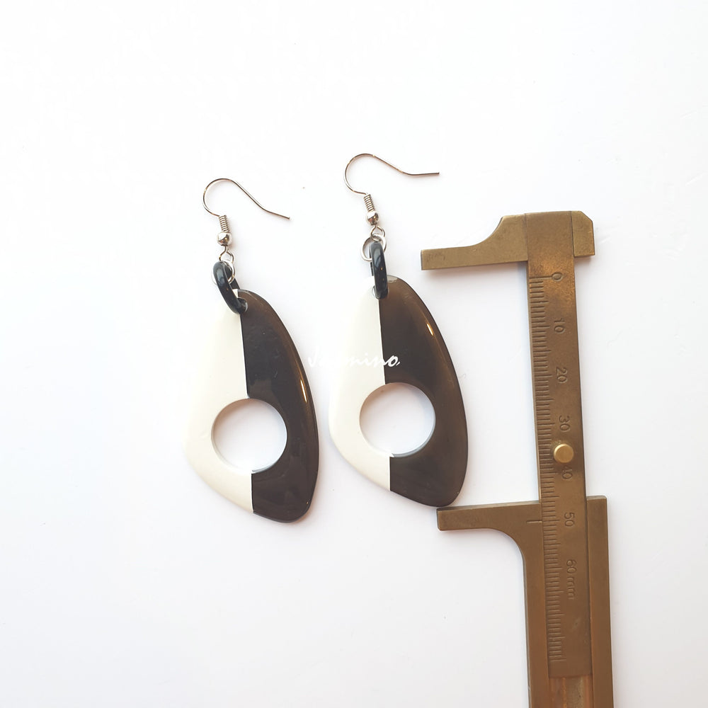
                  
                    Unique handmade earrings with half natural horn and half painted bright white on the light background- 5cm, impressive gift for her
                  
                