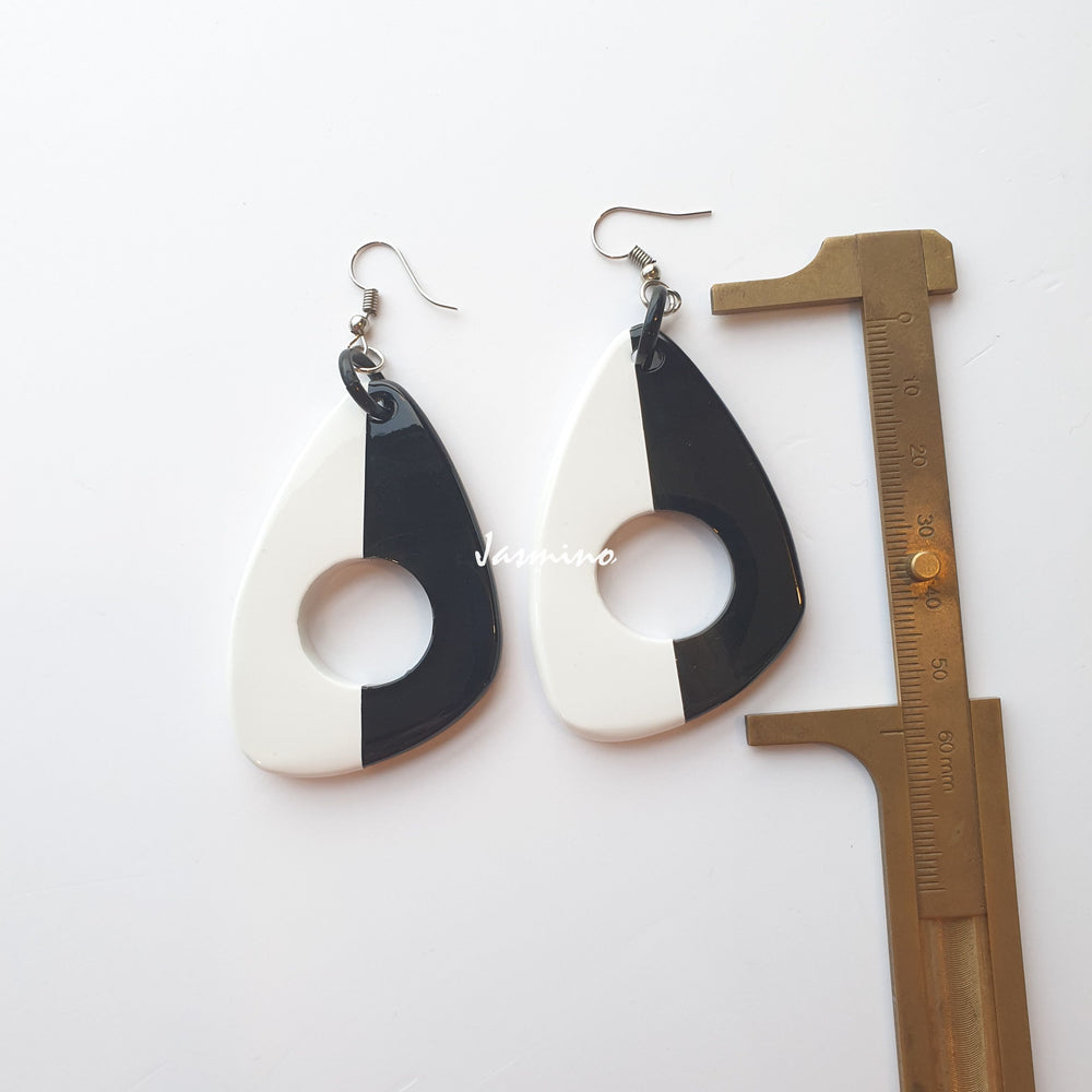 
                  
                    Unique handmade earrings with half natural horn and half painted bright white on the light background- 5cm, impressive gift for her
                  
                