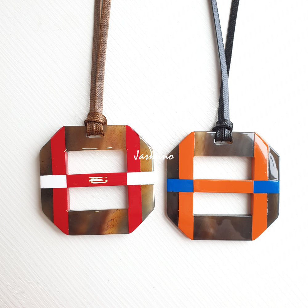 
                  
                    two unique handmade Christmas square pendant necklaces feature red and orange in natural buffalo horn 
                  
                