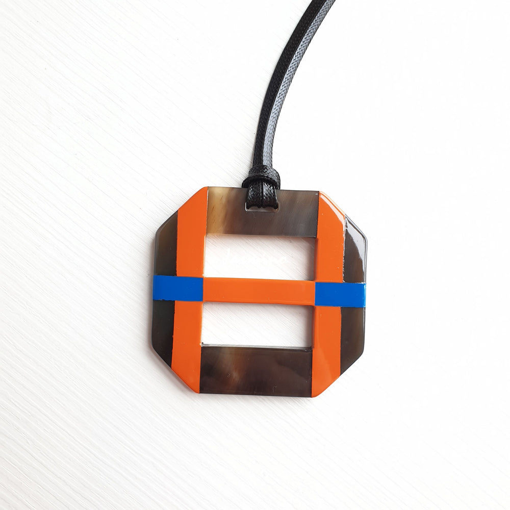 
                  
                    orange lacquer pendant on the light background, impressive gift for her
                  
                