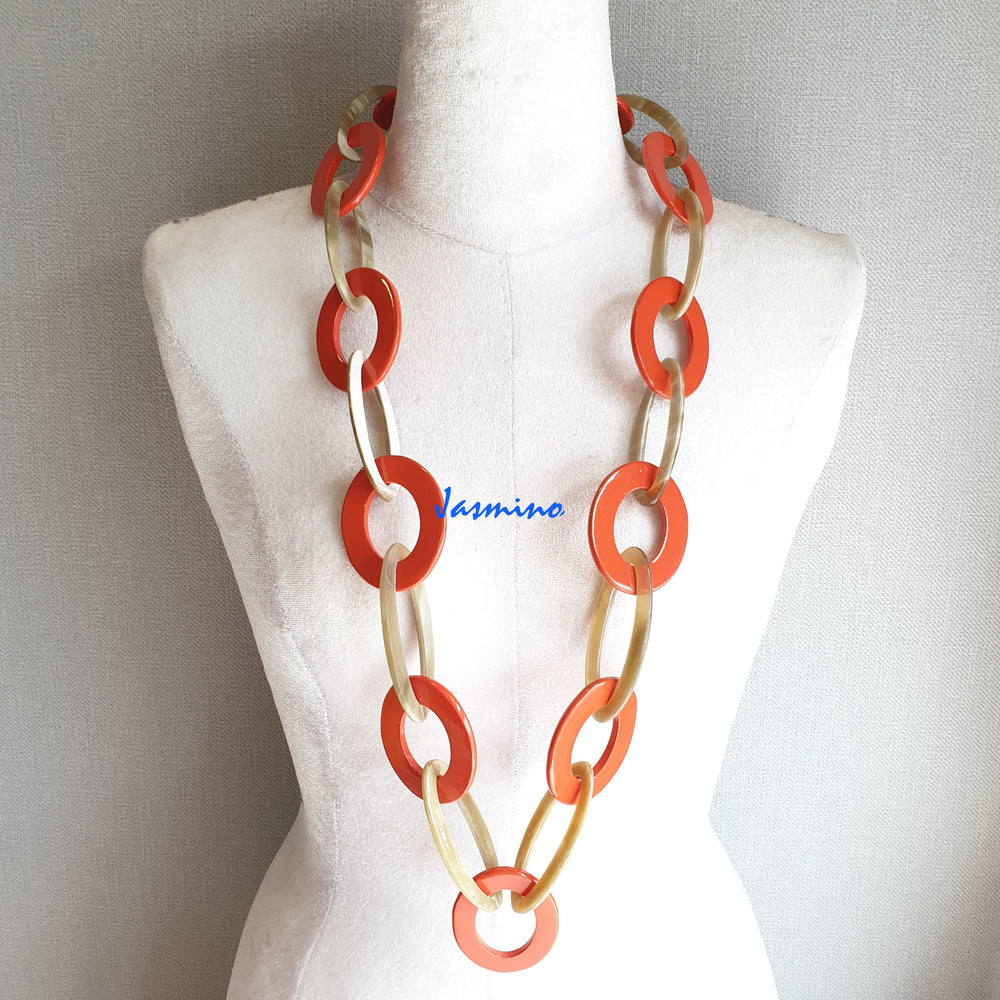 
                  
                    The necklace has several tumeric pieces in natural light, impressive gift for her
                  
                
