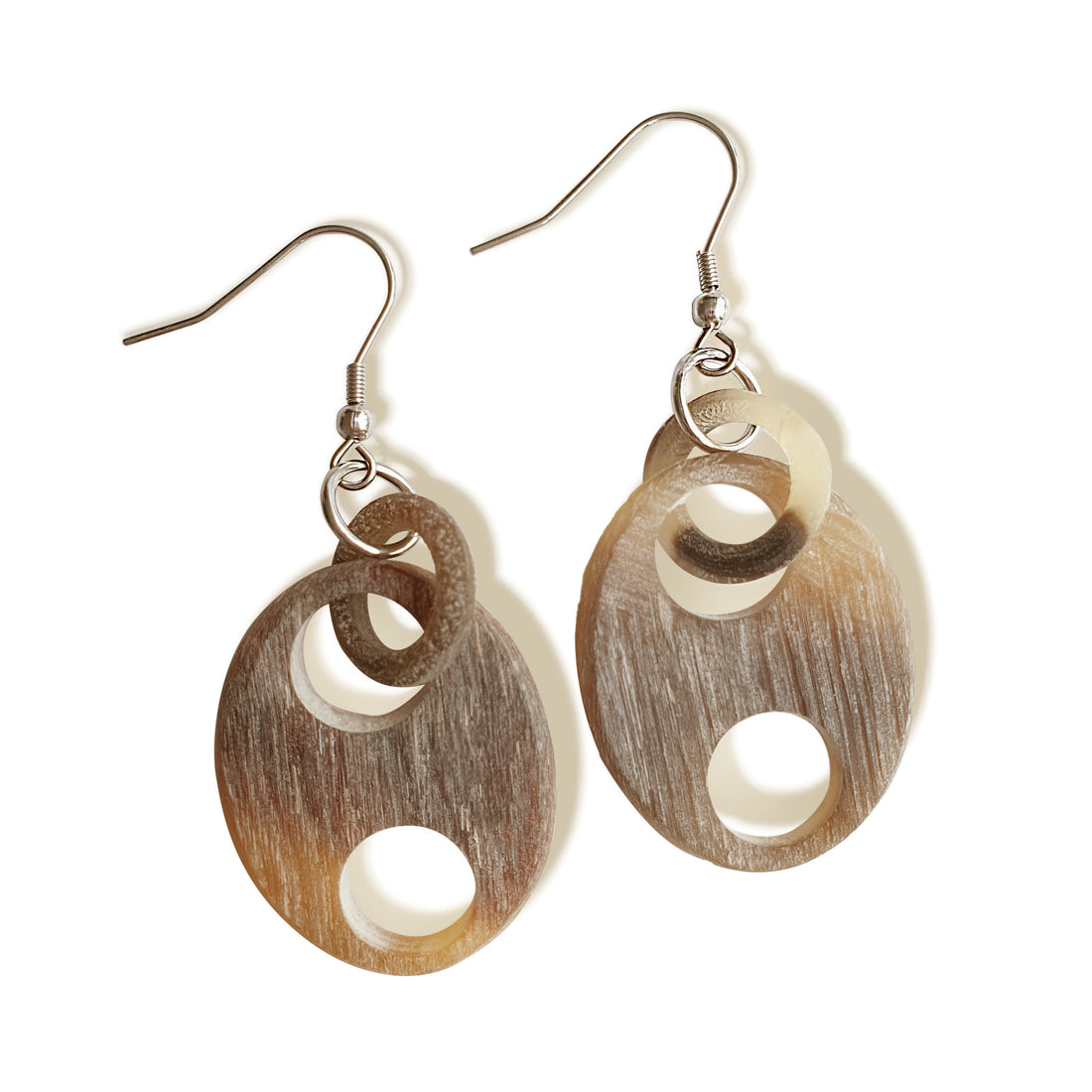 Evil Eye Dangle Earrings are handmade with light grey color under the efforts of craftsman in the natural light
