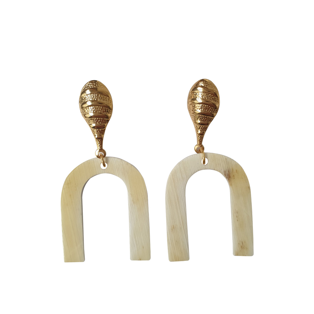 Gold luxury drop earrings are handmade with "H" shape and white color on a white background