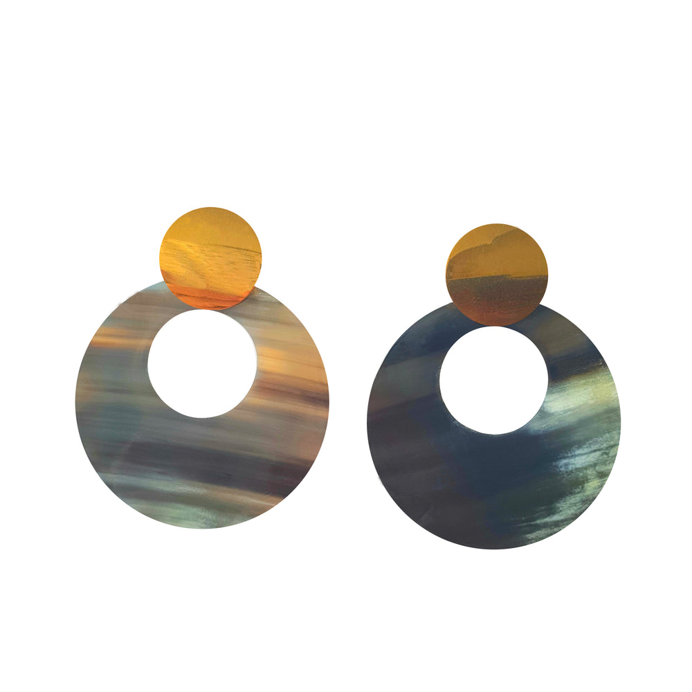
                  
                    Grey full-moon circle drop earrings are handmade with natural buffalo horn material on a white background 
                  
                