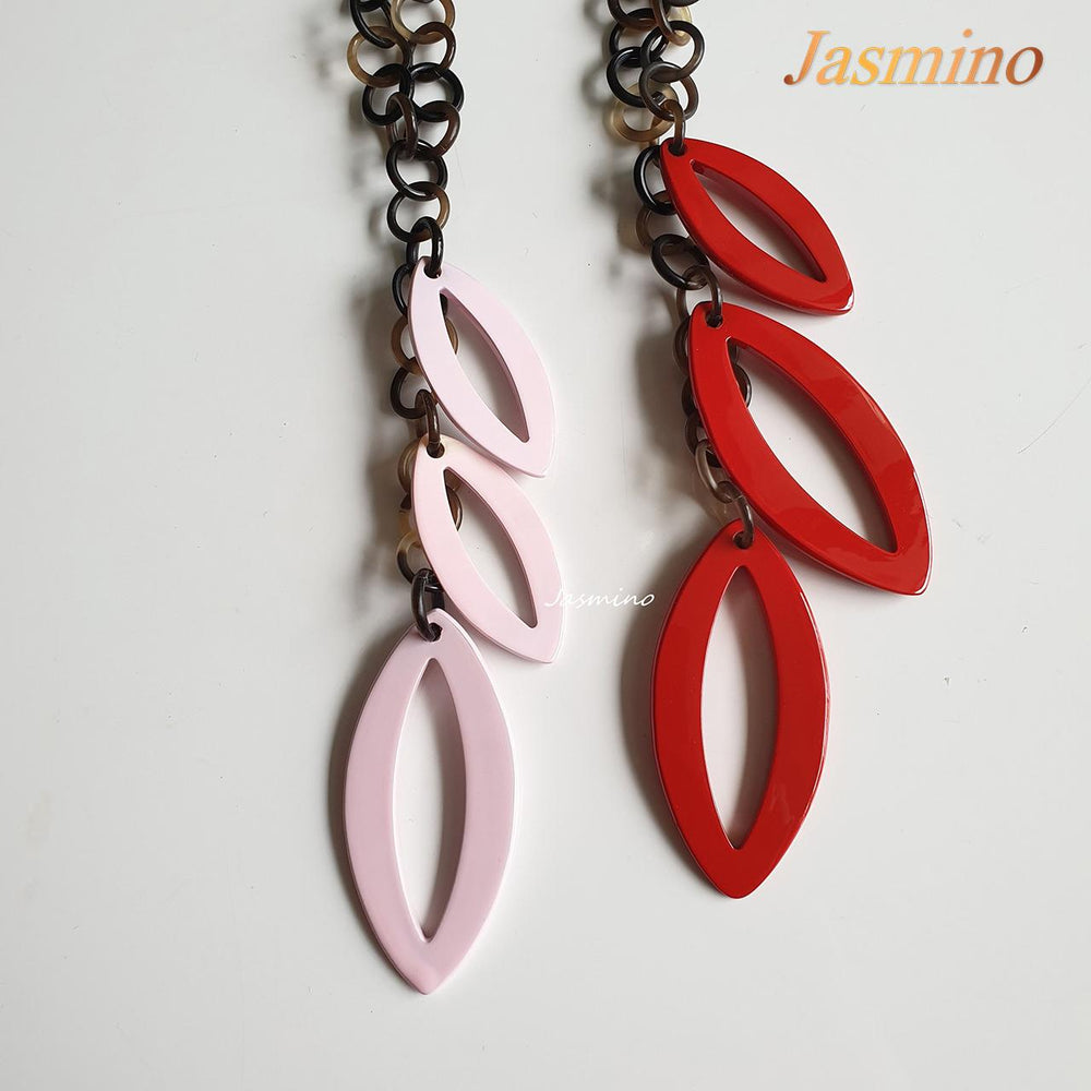 
                  
                    two unique handmade Vintage necklaces have three large leaf-shaped horns painted rose quartz and red, an impressive gift for your friend
                  
                